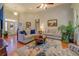 Inviting living room with hardwood floors, coffered ceilings, and comfortable seating arrangements at 410 Fitzgerald Ln, Fayetteville, GA 30215