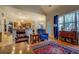 Bright living room with hardwood floors, natural light, and a view of the kitchen at 410 Fitzgerald Ln, Fayetteville, GA 30215