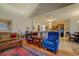 Comfortable open-concept living room with hardwood floors and easy access to the kitchen at 410 Fitzgerald Ln, Fayetteville, GA 30215