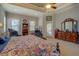 Spacious bedroom with tray ceilings, lots of natural light, and doorway to outside at 410 Fitzgerald Ln, Fayetteville, GA 30215