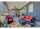 Charming screened porch with comfortable seating and natural light for enjoying the outdoors in comfort at 410 Fitzgerald Ln, Fayetteville, GA 30215