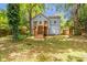Exterior view showcasing a wooden deck with stairs leading to the expansive backyard at 782 Marion Se Ave, Atlanta, GA 30312