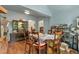 Spacious dining room featuring classic furniture, adjacent to a hallway filled with bookshelves at 782 Marion Se Ave, Atlanta, GA 30312