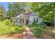 Charming home featuring a welcoming front porch and a neatly landscaped front yard at 782 Marion Se Ave, Atlanta, GA 30312