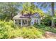 Charming home featuring a welcoming front porch and a neatly landscaped front yard at 782 Marion Se Ave, Atlanta, GA 30312