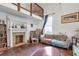 Charming living room with fireplace, loft, and plenty of natural light at 782 Marion Se Ave, Atlanta, GA 30312