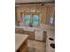 Newly renovated kitchen with island, white cabinets, and modern appliances at 1167 Oakland Sw Dr, Atlanta, GA 30310
