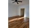 Living room with hardwood floors, neutral walls, and ceiling fan for a comfortable, inviting space at 1167 Oakland Sw Dr, Atlanta, GA 30310