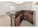 Basement bar area with dark wood cabinetry, counter space, and wine rack at 1575 Petal Nw Pt, Kennesaw, GA 30152