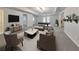Spacious finished basement with a billiard table, TV, and comfortable seating area at 1575 Petal Nw Pt, Kennesaw, GA 30152