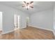 Bright bedroom featuring hardwood floors and ample natural light at 1575 Petal Nw Pt, Kennesaw, GA 30152