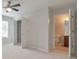 Neutral bedroom featuring a large window, a closet, and an ensuite bathroom at 1575 Petal Nw Pt, Kennesaw, GA 30152