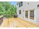 The back deck has a grill and provides an access point to the interior of the home at 1575 Petal Nw Pt, Kennesaw, GA 30152