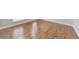 View of the shiny hardwood floor in a room with bright and neutral walls at 1575 Petal Nw Pt, Kennesaw, GA 30152