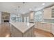Gourmet kitchen with island, stainless appliances, and eat-in area at 1575 Petal Nw Pt, Kennesaw, GA 30152