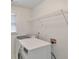 Laundry room with a washer and dryer, and wire shelving for storage at 1575 Petal Nw Pt, Kennesaw, GA 30152