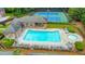 Aerial view of the community pool, tennis courts, and surrounding amenities at 1575 Petal Nw Pt, Kennesaw, GA 30152