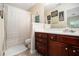 Bathroom featuring a shower, cabinets, vanity, and neutral wall color at 2555 Flat Shoals Rd # 1405, Atlanta, GA 30349
