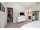 Bedroom boasts a walk-in closet, stylish dresser, and easy access to an ensuite bathroom at 2555 Flat Shoals Rd # 1405, Atlanta, GA 30349