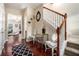 Inviting entryway with hardwood floors, a staircase, and decorative accents creating a warm and stylish first impression at 2555 Flat Shoals Rd # 1405, Atlanta, GA 30349
