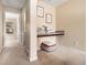 Hallway niche with a built-in desk, storage, and neutral carpet at 2555 Flat Shoals Rd # 1405, Atlanta, GA 30349