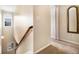 Bright stairway with carpet flooring and natural light from two windows at 2555 Flat Shoals Rd # 1405, Atlanta, GA 30349