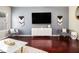 Stylish living room features modern decor, sleek furniture, and hardwood floors, creating an inviting and elegant space at 2555 Flat Shoals Rd # 1405, Atlanta, GA 30349