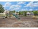 Community playground with slides and play equipment, offering a fun and safe recreational space at 2555 Flat Shoals Rd # 1405, Atlanta, GA 30349