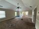 Spacious bedroom with a ceiling fan, multiple windows, and ample natural light at 381 Plymstock Dr, Mcdonough, GA 30253