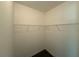 Walk-in closet with wire shelving for organized storage at 381 Plymstock Dr, Mcdonough, GA 30253
