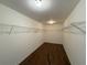 Walk-in closet equipped with extensive wire shelving for maximum storage capacity at 381 Plymstock Dr, Mcdonough, GA 30253
