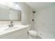 Modern bathroom with white marble walk-in shower, large mirror, and updated fixtures at 703 Alvis Ln, Norcross, GA 30093