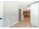 Open hallway with neutral walls and modern lighting at 703 Alvis Ln, Norcross, GA 30093