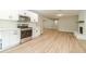 Modern kitchen features stainless steel appliances and ample counter space at 703 Alvis Ln, Norcross, GA 30093