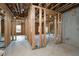 Unfinished basement with wood framing and exposed ceiling joists at 1300 Winfair Ne Ln, Brookhaven, GA 30329