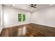A spacious bedroom with dark wood floors and natural light at 1317 Bernard Nw St, Atlanta, GA 30314