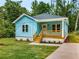 Charming light blue bungalow with a cozy front porch and newly landscaped front yard at 1317 Bernard Nw St, Atlanta, GA 30314