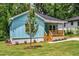 Charming light blue bungalow with a cozy front porch and newly landscaped front yard at 1317 Bernard Nw St, Atlanta, GA 30314