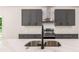 Close up shot of modern kitchen details with stainless steel sink and fixtures at 1317 Bernard Nw St, Atlanta, GA 30314