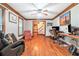 Bright and airy home office with hardwood floors, large windows, and ample workspace at 3392 Inns Brook Way, Snellville, GA 30039