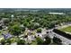 Scenic aerial view of the neighborhood showcasing the lush greenery and water tower at 380 South St, Buford, GA 30518