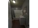 Cozy bathroom with a vanity and shower featuring a curtain at 380 South St, Buford, GA 30518