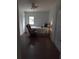 Well-lit bedroom with a comfortable bed and relaxing chair at 380 South St, Buford, GA 30518