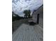 Spacious deck area with table, chairs, and backyard views at 380 South St, Buford, GA 30518