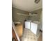 Well-lit laundry room area with modern washer and dryer at 380 South St, Buford, GA 30518