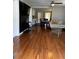 The living room has hardwood floors, neutral paint, and an open floorplan at 380 South St, Buford, GA 30518
