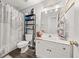 Clean bathroom offers modern fixtures and a shower-tub combination at 858 Red Rock Ct, Suwanee, GA 30024