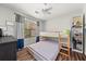Comfortable bedroom features a bunk bed, fan, and a bright window at 858 Red Rock Ct, Suwanee, GA 30024