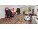 Spacious bonus room features wood floors and plenty of room for entertainment at 858 Red Rock Ct, Suwanee, GA 30024