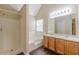 Bathroom featuring double sinks, a shower-tub combo, and modern fixtures at 330 Kentwood Springs Dr, Hampton, GA 30228